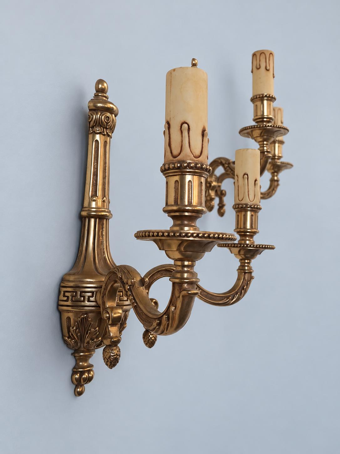 Vintage Pair of Louis XVI Style Wall Sconces, Gilt Metal Fluted Column with Greek Key Band and Pine Cone Drops, Two Lights Each, 30 cm