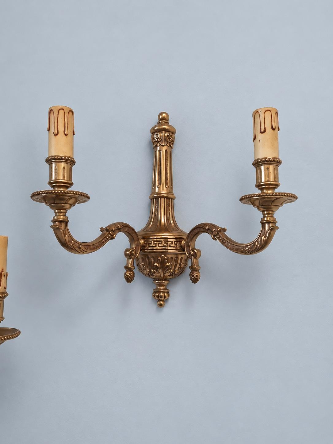 Vintage Pair of Louis XVI Style Wall Sconces, Gilt Metal Fluted Column with Greek Key Band and Pine Cone Drops, Two Lights Each, 30 cm