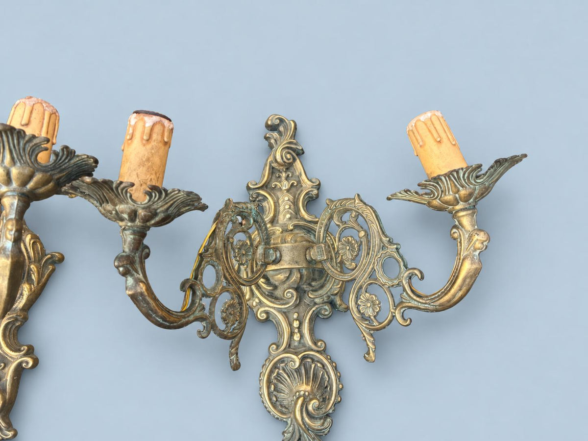Vintage Pair of Louis XV Rocaille Style Wall Sconces, Cast Metal with Green Patina, Shell Crest and Pierced Scroll Arms, Two Lights Each