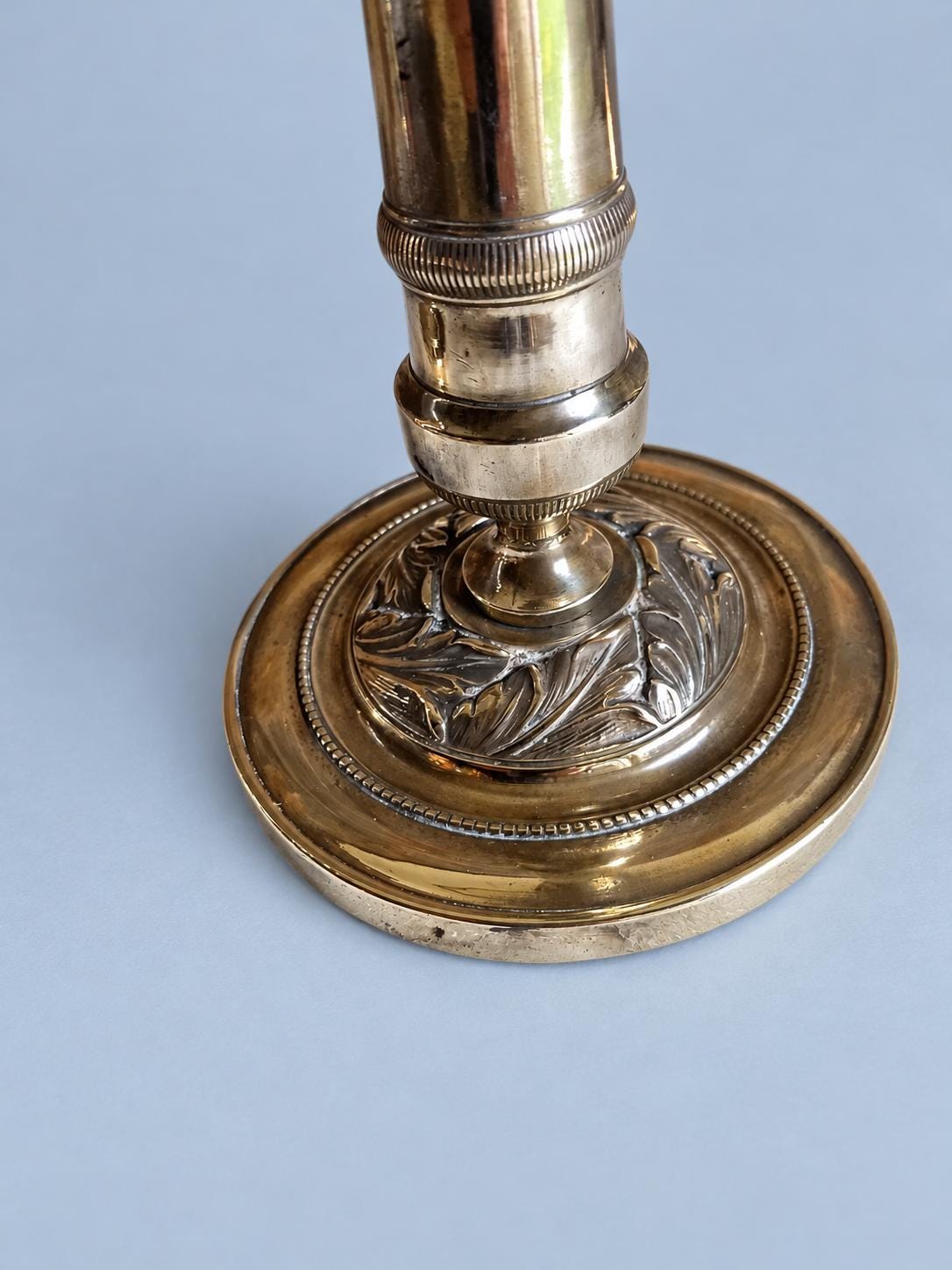 Vintage Small Pair of Empire Style Column Candlesticks, Polished Gold-Tone Metal with Leaf-Decorated Bases, 24 cm
