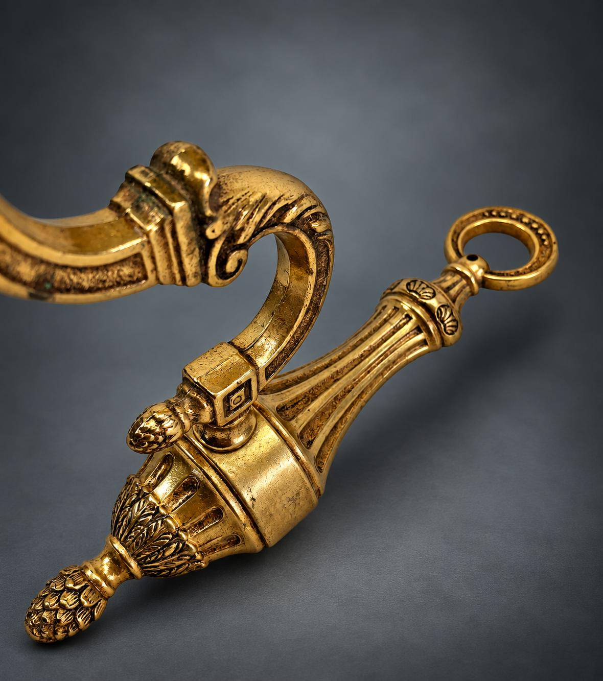 Pair of Louis XVI Style Single-Arm Wall Sconces, Gilt Metal with Acanthus Scroll Arms and Pine Cone Finials