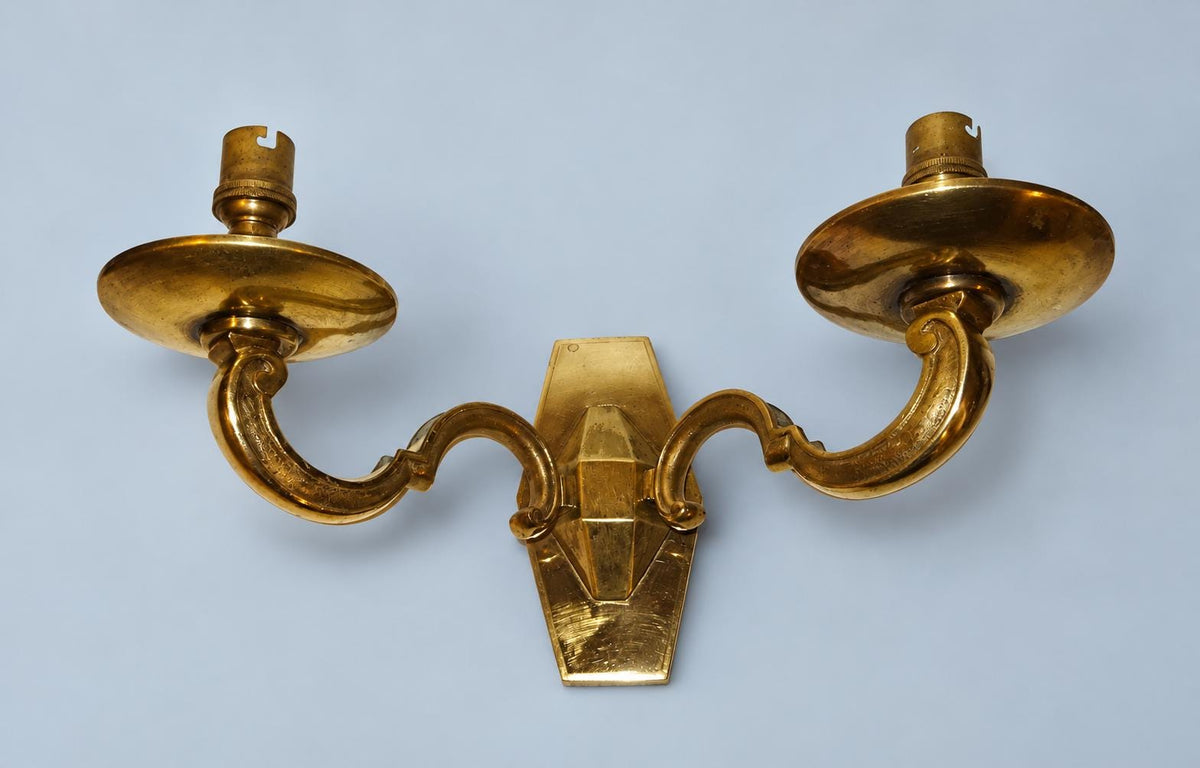Vintage Pair of Louis XIV Style Polished Brass Wall Sconces, Faceted Backplates with Heavy Scroll Arms, Two Lights Each