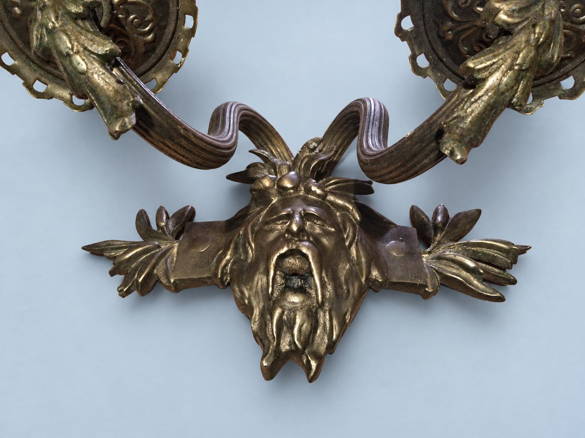 Vintage Pair of Wall Sconces with Bearded Bacchus-Style Masks, Patinated Metal with Leafy Arms, Two Lights Each