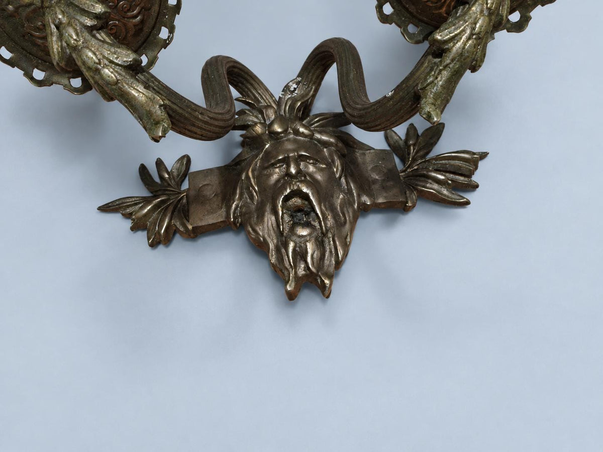 Vintage Pair of Wall Sconces with Bearded Bacchus-Style Masks, Patinated Metal with Leafy Arms, Two Lights Each
