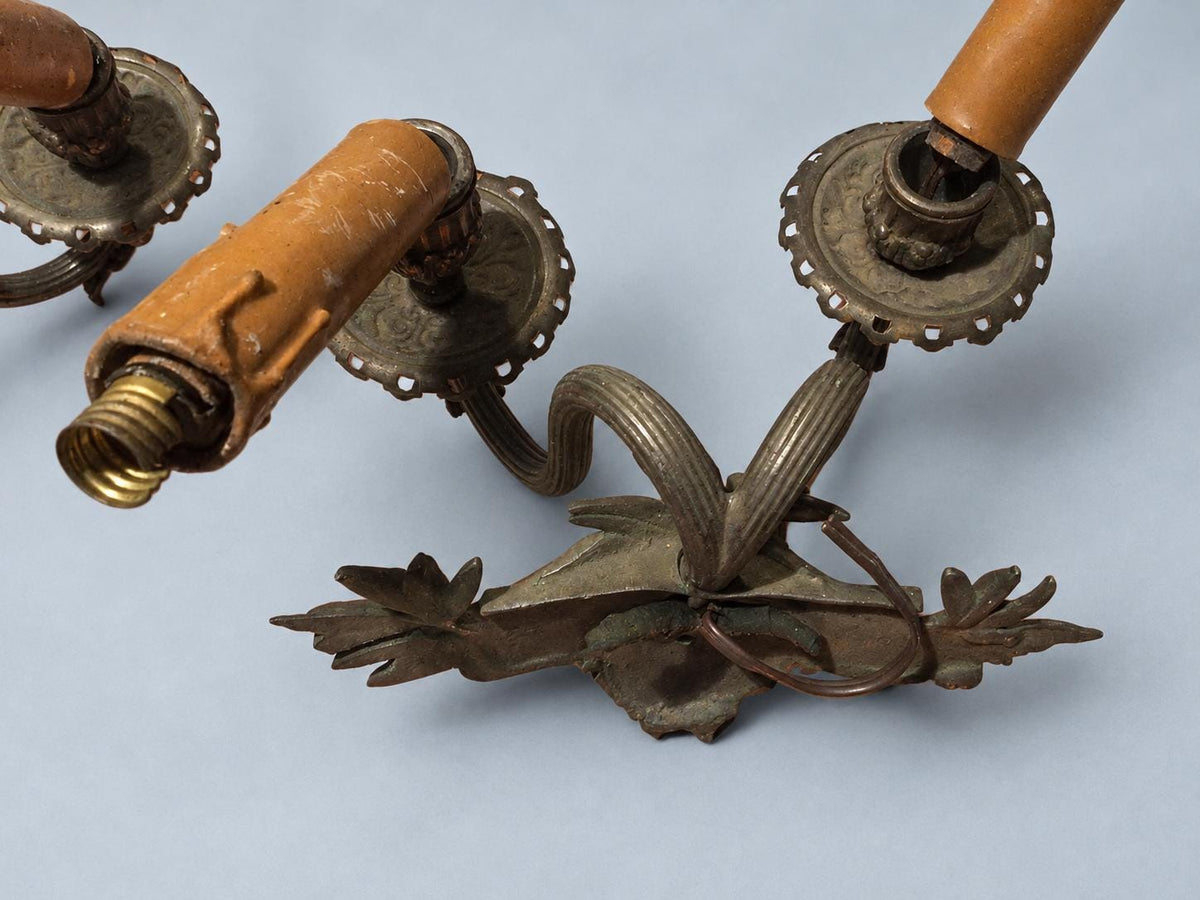 Vintage Pair of Wall Sconces with Bearded Bacchus-Style Masks, Patinated Metal with Leafy Arms, Two Lights Each