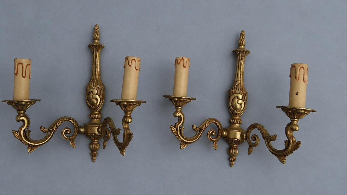 Vintage Pair of Louis XV Style Gilt Metal Wall Sconces, Flame Finials and C-Scroll Backplates, Leafy Scrolled Arms, Two Lights Each