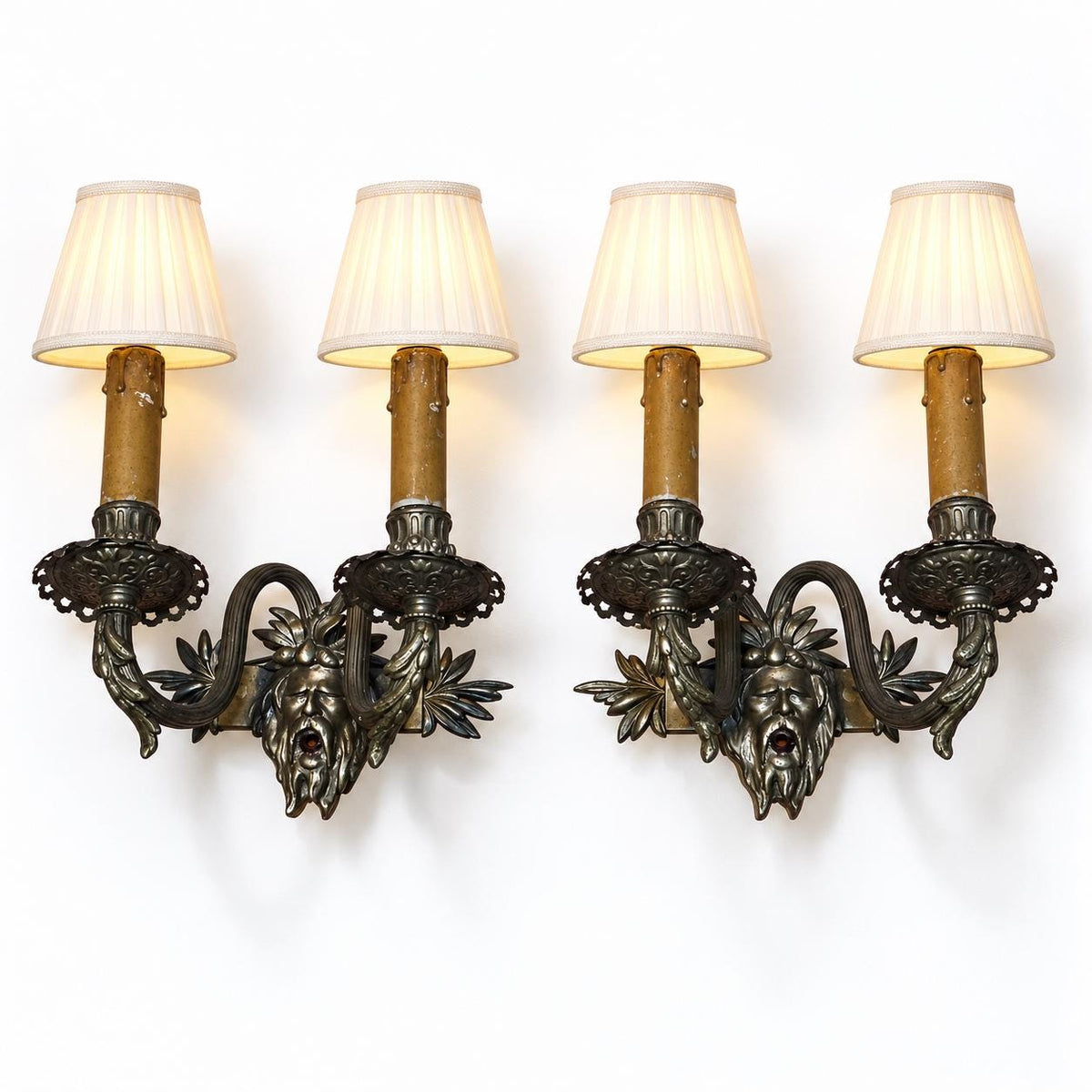 Vintage Pair of Wall Sconces with Bearded Bacchus-Style Masks, Patinated Metal with Leafy Arms, Two Lights Each