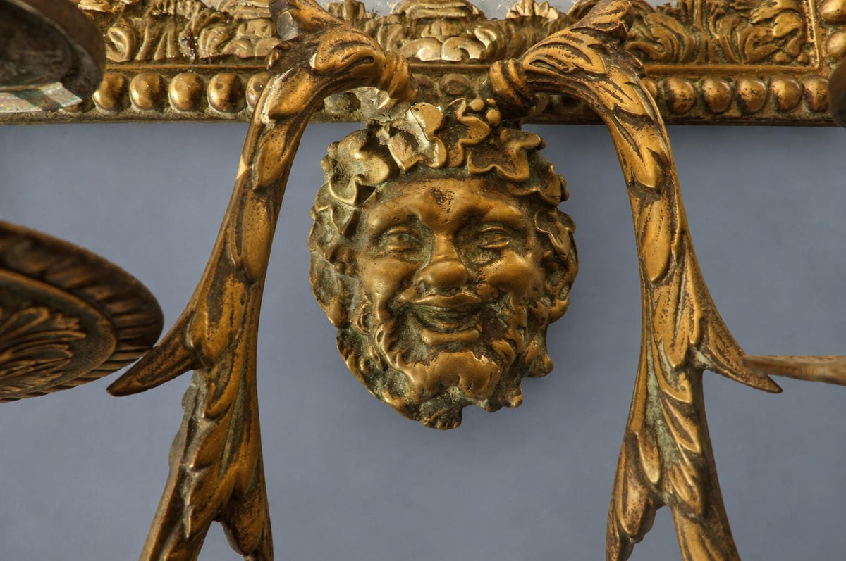 Vintage Pair of Mirror Wall Sconces with Masks, Patinated Metal Beaded Frames and Palmette Crests, Bevelled Mirrors, Two Lights Each, 41 cm