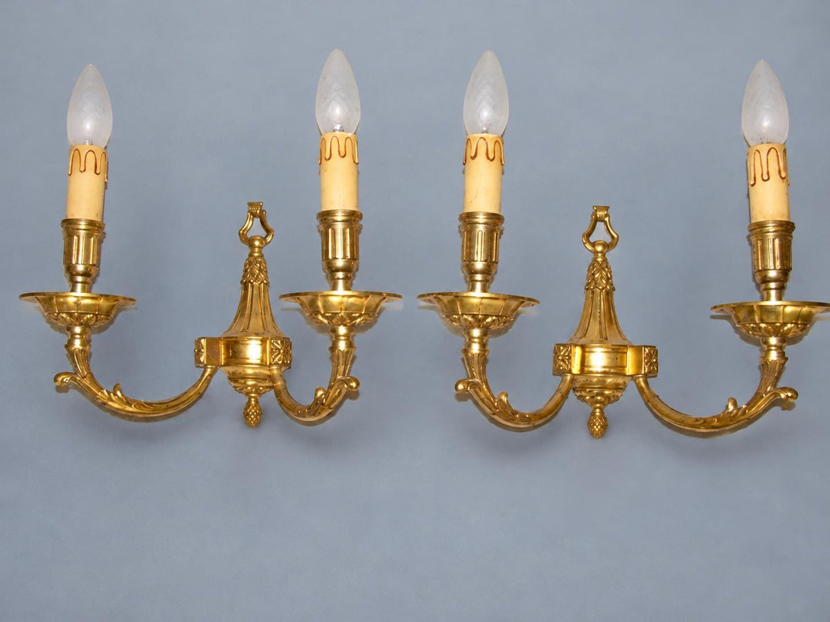 Vintage Pair of Louis XVI Style Gilt Metal Wall Sconces, Ring-Topped Baluster Backplates with Rosettes, Attributed Early 20th Century