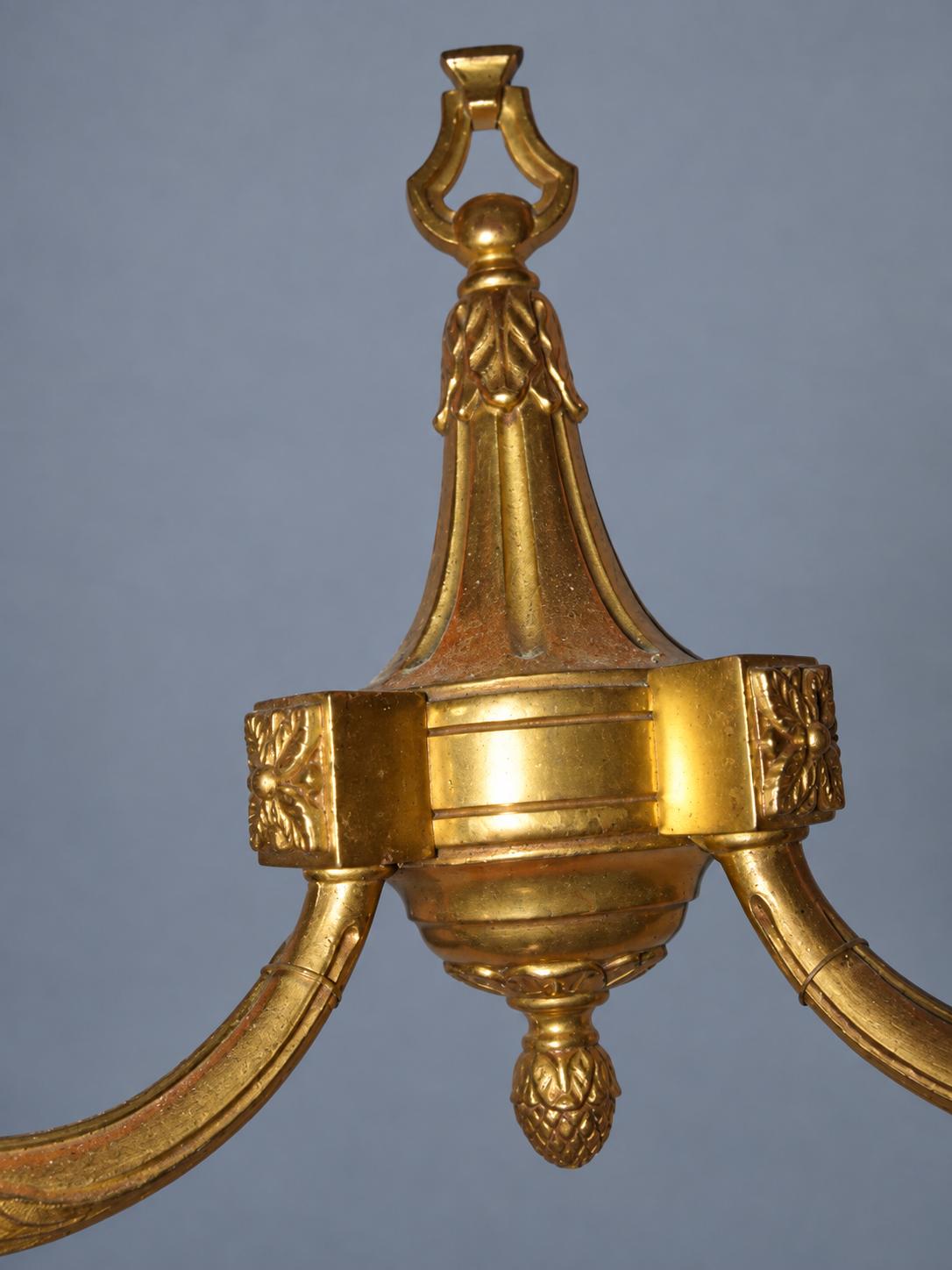 Vintage Pair of Louis XVI Style Gilt Metal Wall Sconces, Ring-Topped Baluster Backplates with Rosettes, Attributed Early 20th Century