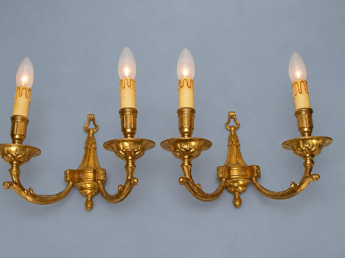Vintage Pair of Louis XVI Style Gilt Metal Wall Sconces, Ring-Topped Baluster Backplates with Rosettes, Attributed Early 20th Century
