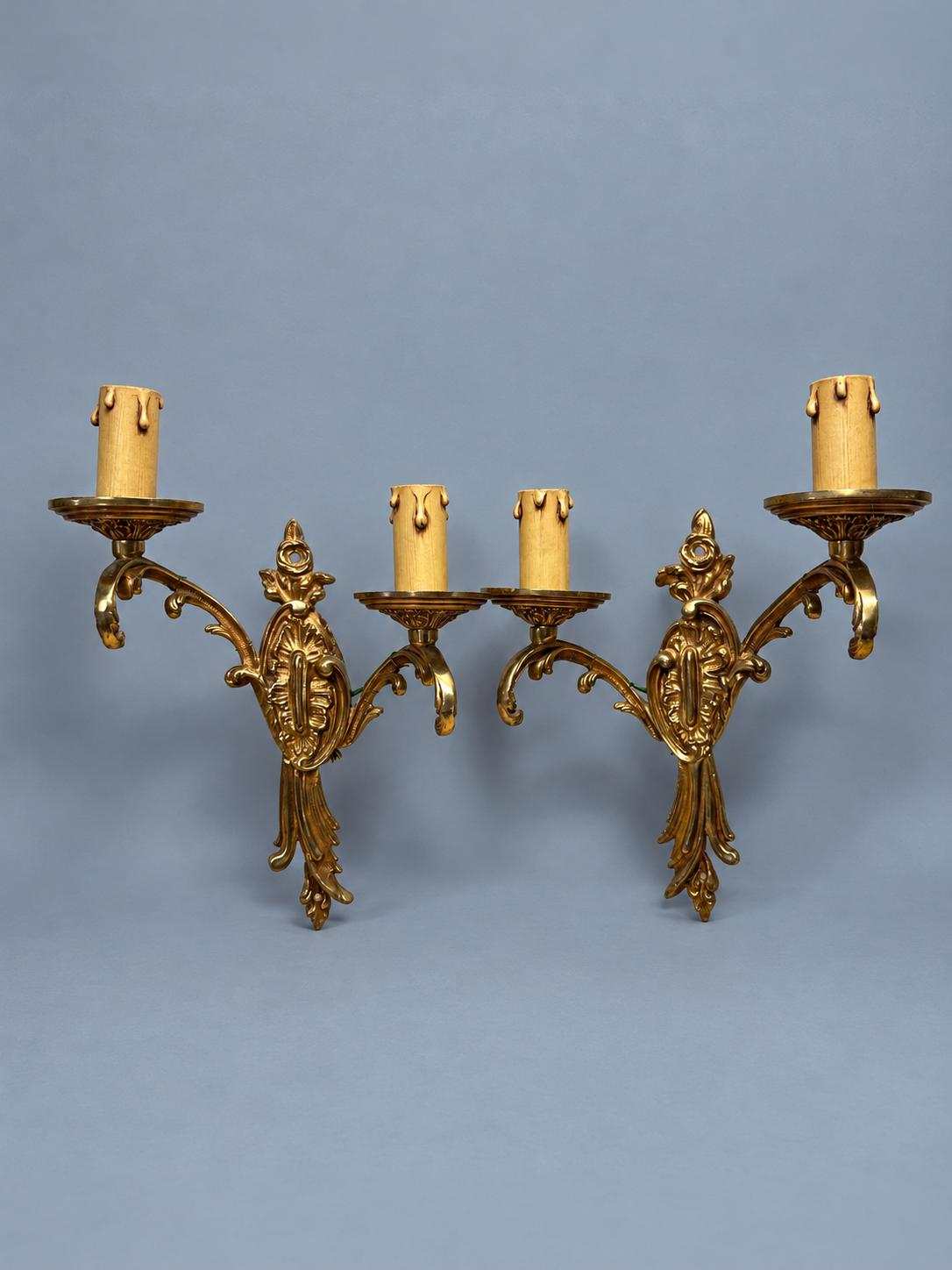 Pair of Vintage Gilt Bronze Two-Arm Wall Sconces, Oval Foliate Cartouche Backplates, Scrolled Arms and Yellow Candle Sleeves