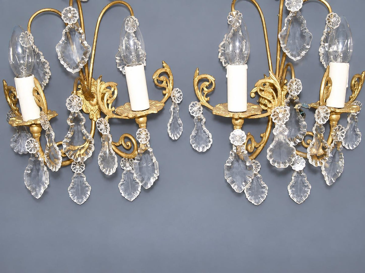 Vintage Pair of Gilt Metal Wall Sconces with Faceted Glass Drops, Two Lights Each, Scrolled Arms and Arched Hoops, Early 20th Century, 33 cm