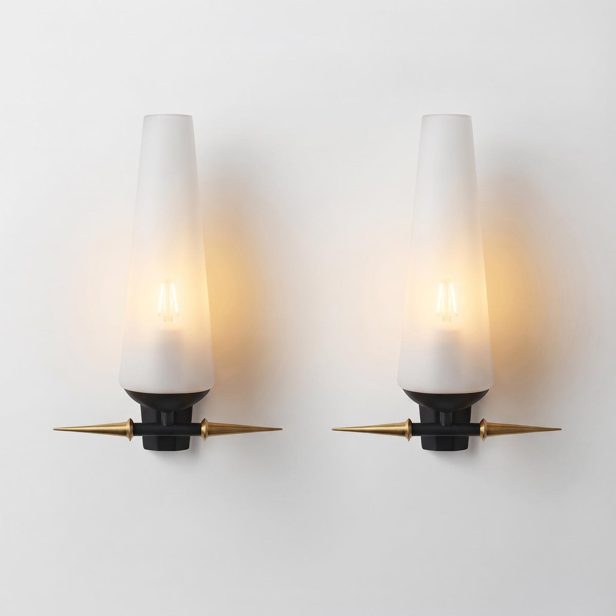 Pair of Mid-Century Style Wall Sconces, Frosted White Glass Cone Shades, Brass-Tone Arms and Black Wall Plates