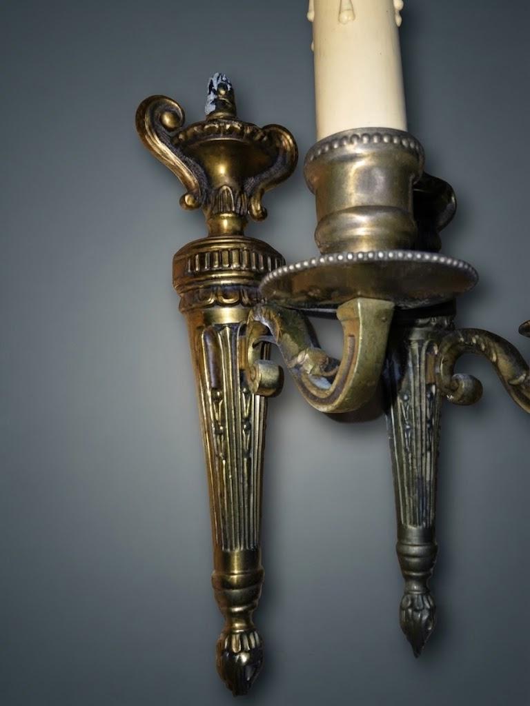 Pair of Louis XVI Style Single-Arm Wall Sconces, Gold-Tone Metal with Fluted Back Plates, Urn Tops and Beaded Drip Pans