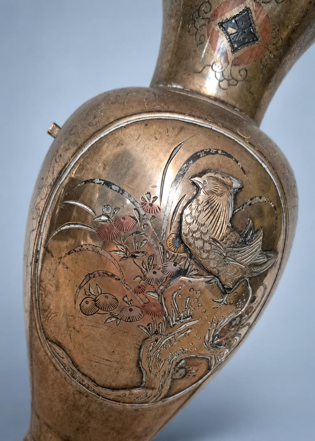 Antique Pair of Meiji Style Mixed-Metal Vases, Bird, Bamboo and Rock Panels in Copper, Gold and Silver Tones