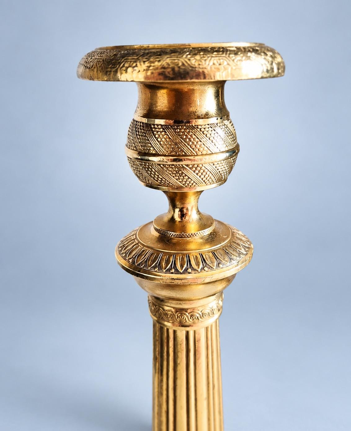 Vintage Pair of Empire Style Brass-Tone Candlesticks, Fluted Columns and Foliate Domed Bases