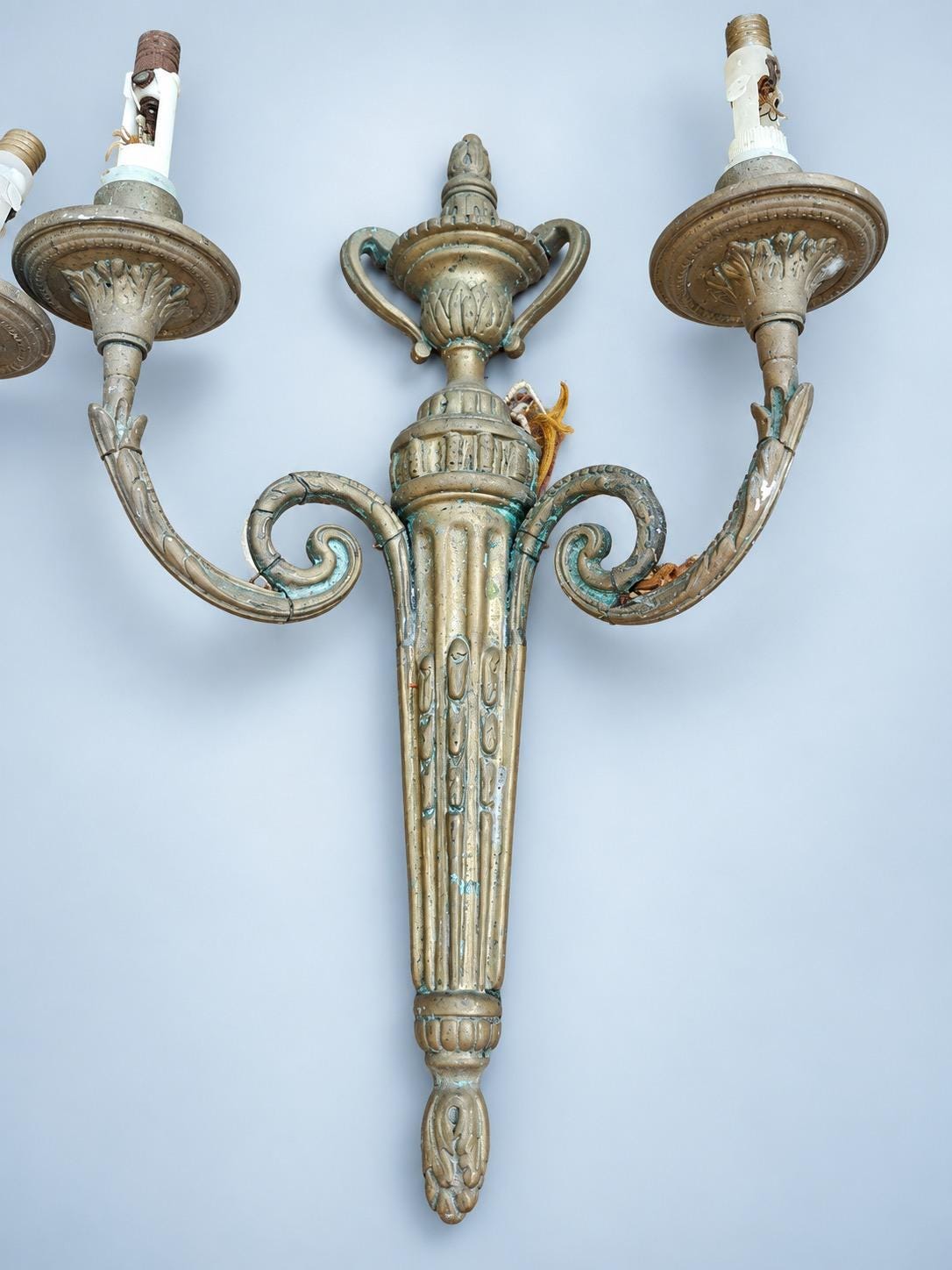 Antique Pair of Large Transition Style Bronze-Tone Two-Arm Wall Sconces with Urn Crest