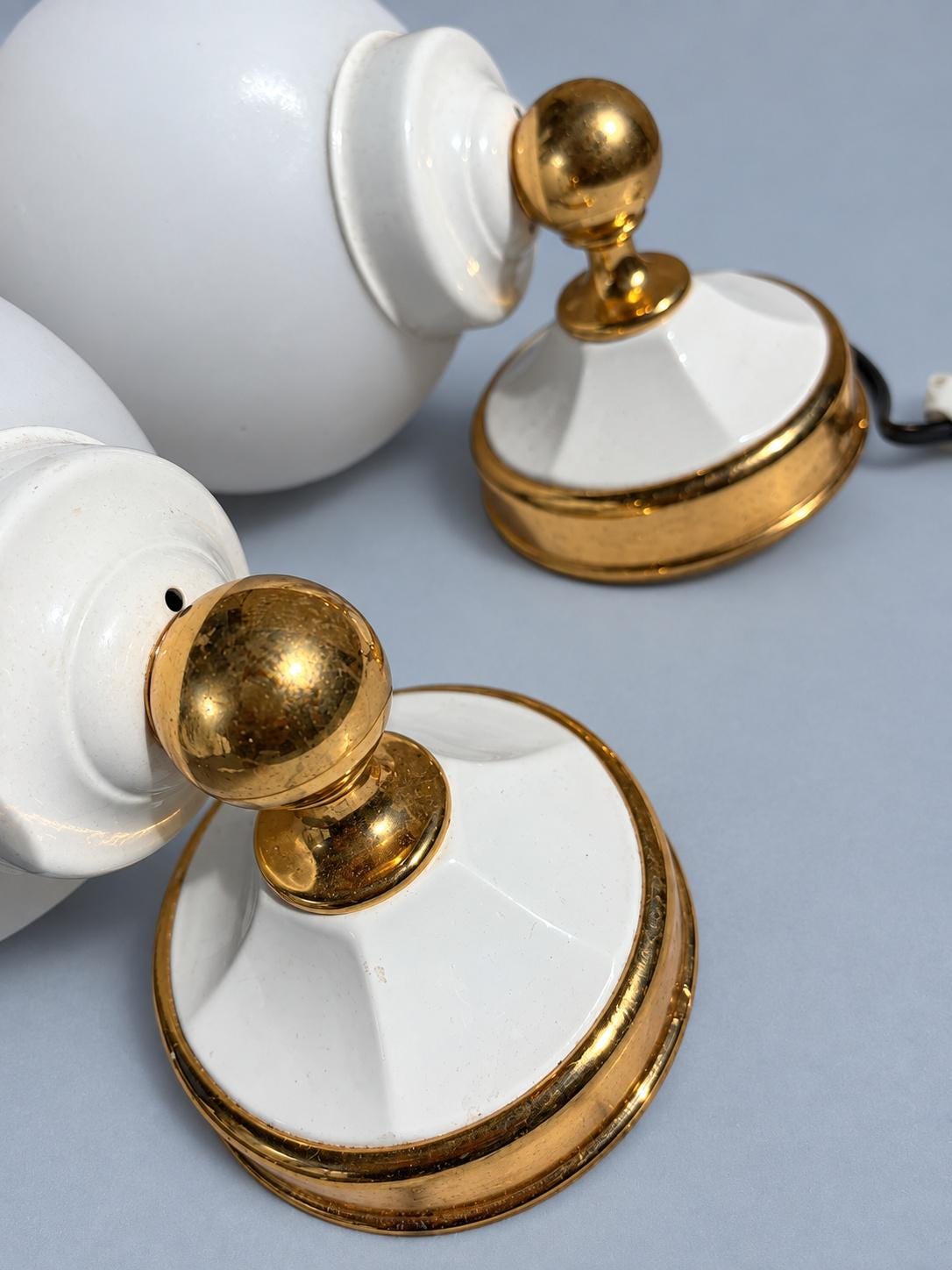 Vintage Pair of Hollywood Regency Style White and Gold-Tone Globe Wall Sconces