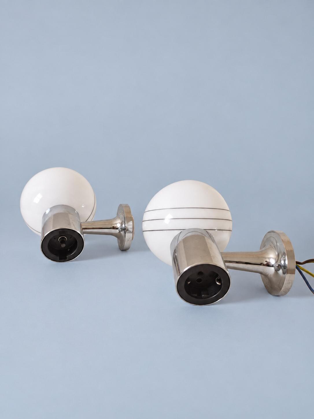 Pair of Vintage White Glass Globe Wall Sconces, Three Curved Grey Stripes, Chrome-Tone Cylinders and Round Backplates
