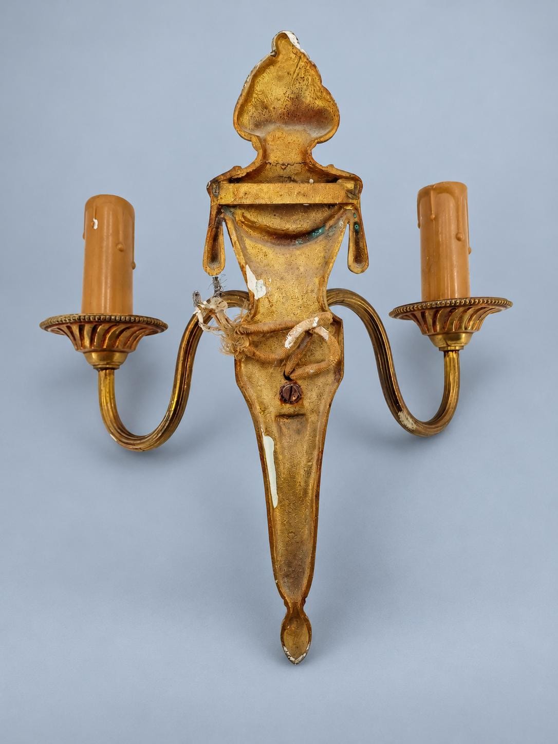 Vintage Pair of Louis XVI Style Two-Arm Gilt Metal Wall Sconces with Flaming Urns and Tasselled Swags