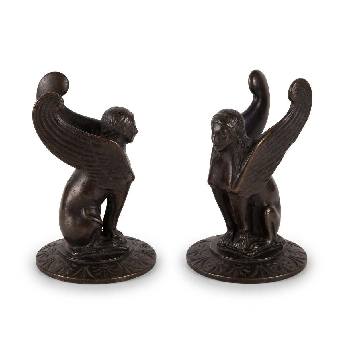 Vintage Pair of Neoclassical Style Winged Sphinx Figures, Patinated Metal on Palmette Bases, Sold as Bookends