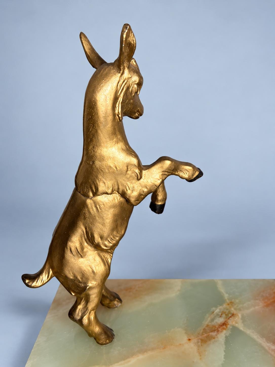 Vintage Art Deco Spelter Sculpture of Pan Playing Pipes with Leaping Goat, Silver and Gold Finish on Onyx and Black Marble Base