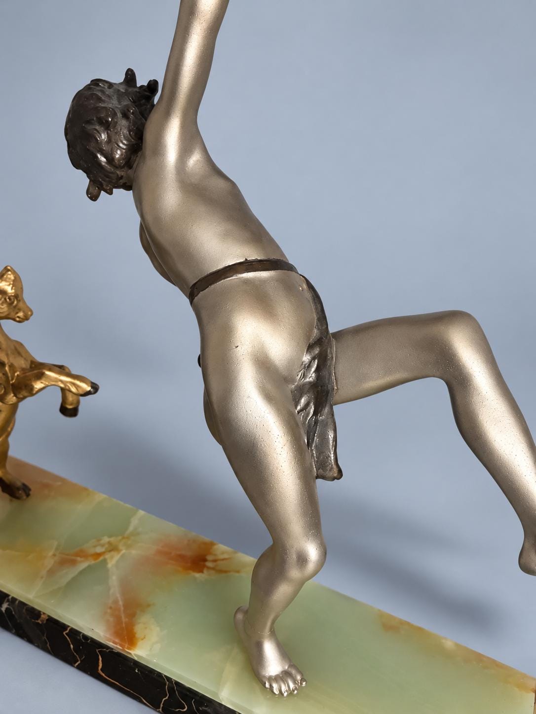 Vintage Art Deco Spelter Sculpture of Pan Playing Pipes with Leaping Goat, Silver and Gold Finish on Onyx and Black Marble Base