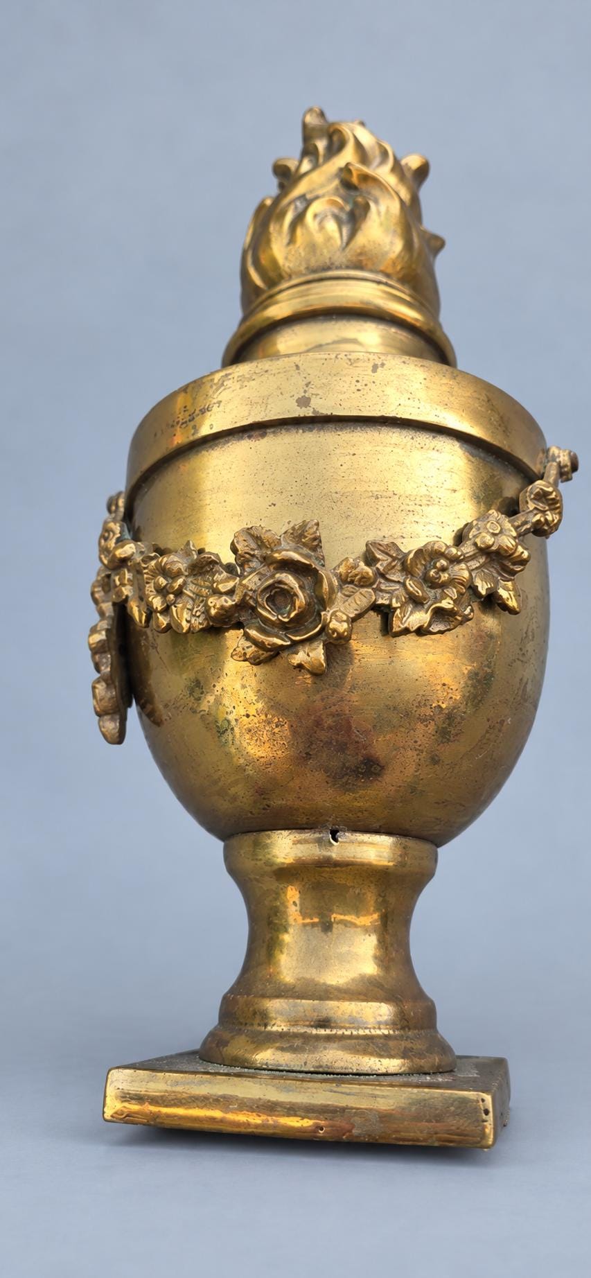 Antique French Louis XVI Style Brass Cassolette Urn with Flame Finial and Rose Garland, Neoclassical Mantel Ornament, Circa 1880–1920