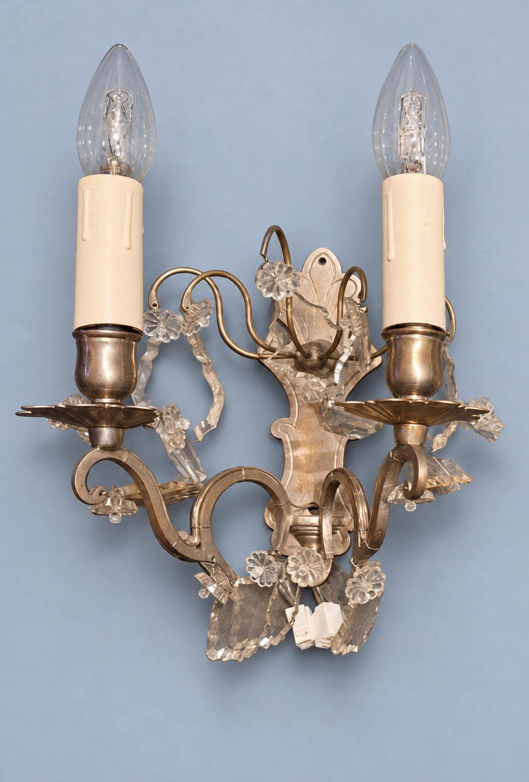 Pair of Vintage Louis XV Style Nickel-Plated Brass Wall Sconces with Crystal Drops, Two-Arm Silver-Tone Lights, Circa 1920s–1940s