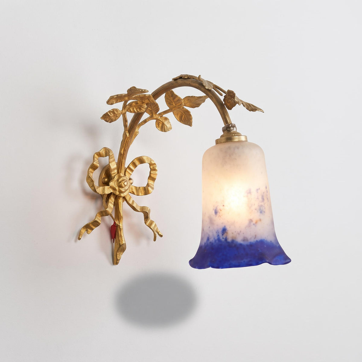Vintage Single Louis XVI Style Gilt Metal Wall Sconce with Ribbon Bow, Leafy Branches and Mottled Cobalt Glass Tulip Shade