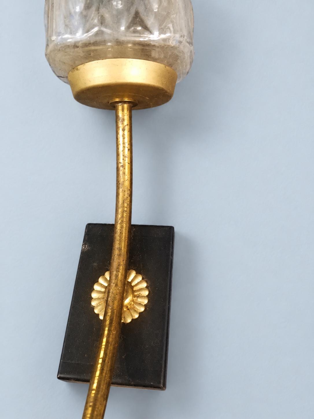 Vintage Pair of Brass Wall Sconces, Attributed 1950s–60s, Tall Pressed Glass Shades on Black Wall Plates with Rosettes, 34 cm