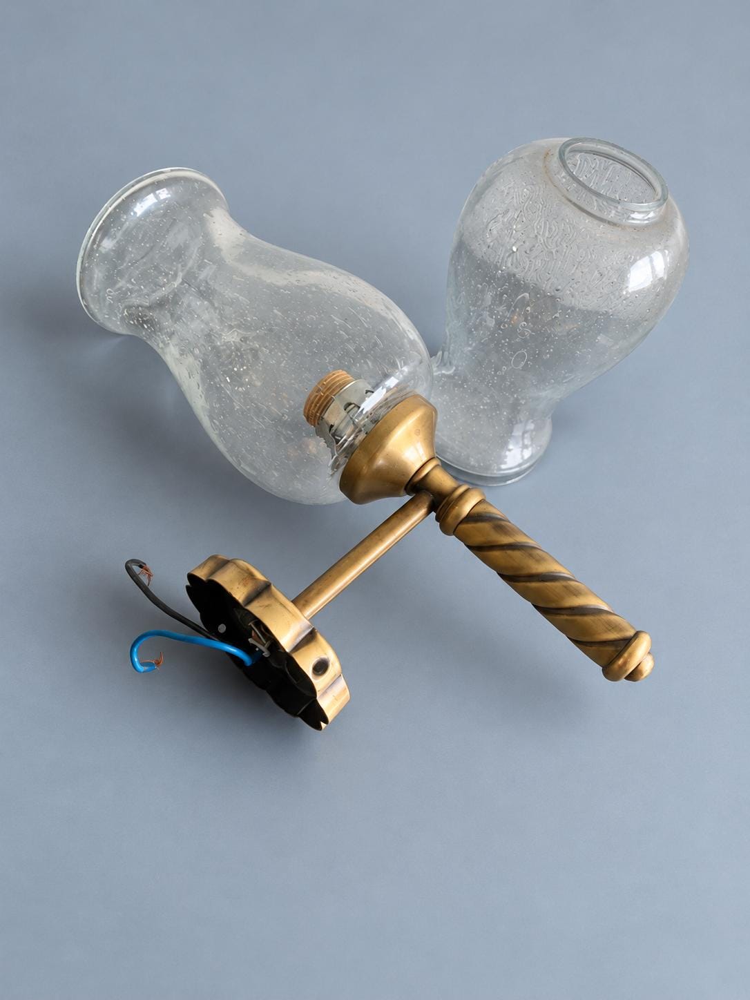 Torch-Style Wall Sconce with Twisted Brass-Tone Column and Clear Seeded Glass Shade, Spare Glass Included, 29.5 cm