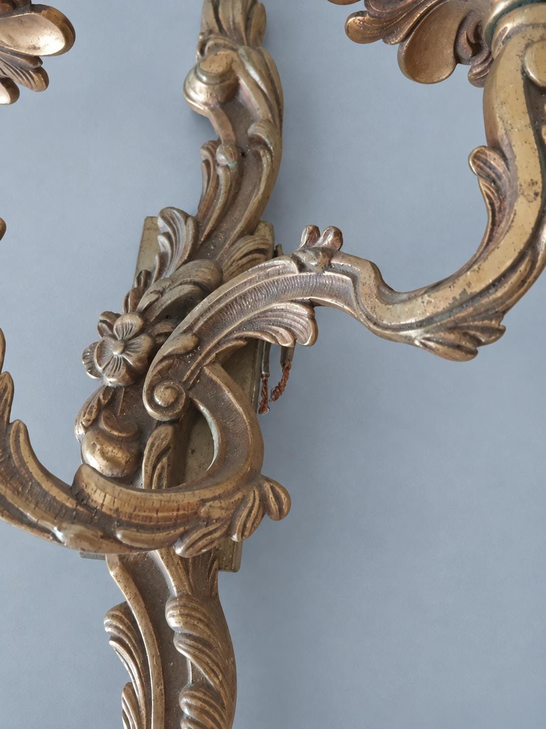 Vintage Pair of Louis XV Rocaille Style Brass Wall Sconces, Mirror-Image Scrolled Arms with Shell Bobèches, Two Lights Each, 37 cm