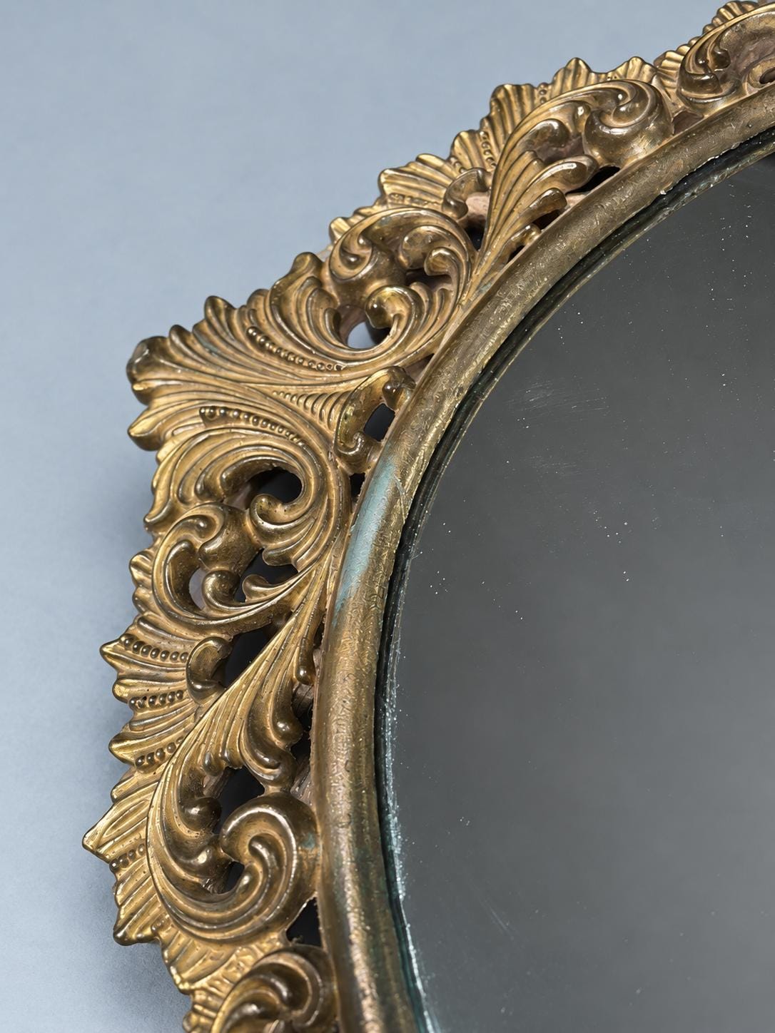 Vintage Oval Wall Mirror with Openwork Scrolled Brass-Tone Frame, Baroque Hollywood Regency Style, 40 × 29 cm