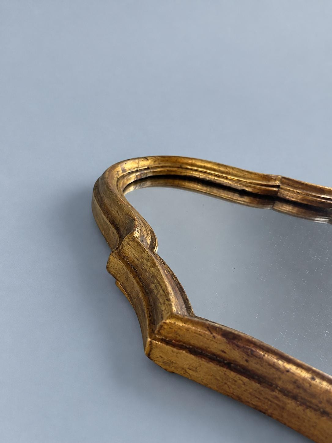 Vintage Small Gold-Tone Wall Mirror with Arched Shaped Frame and Softly Worn Gilding, 21 × 32 cm