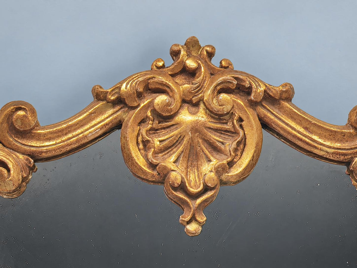 Vintage Rocaille Style Giltwood and Gilt Stucco Mirror, Shell Crest and Scrolls, Shaped Frame on Small Feet, 42 cm