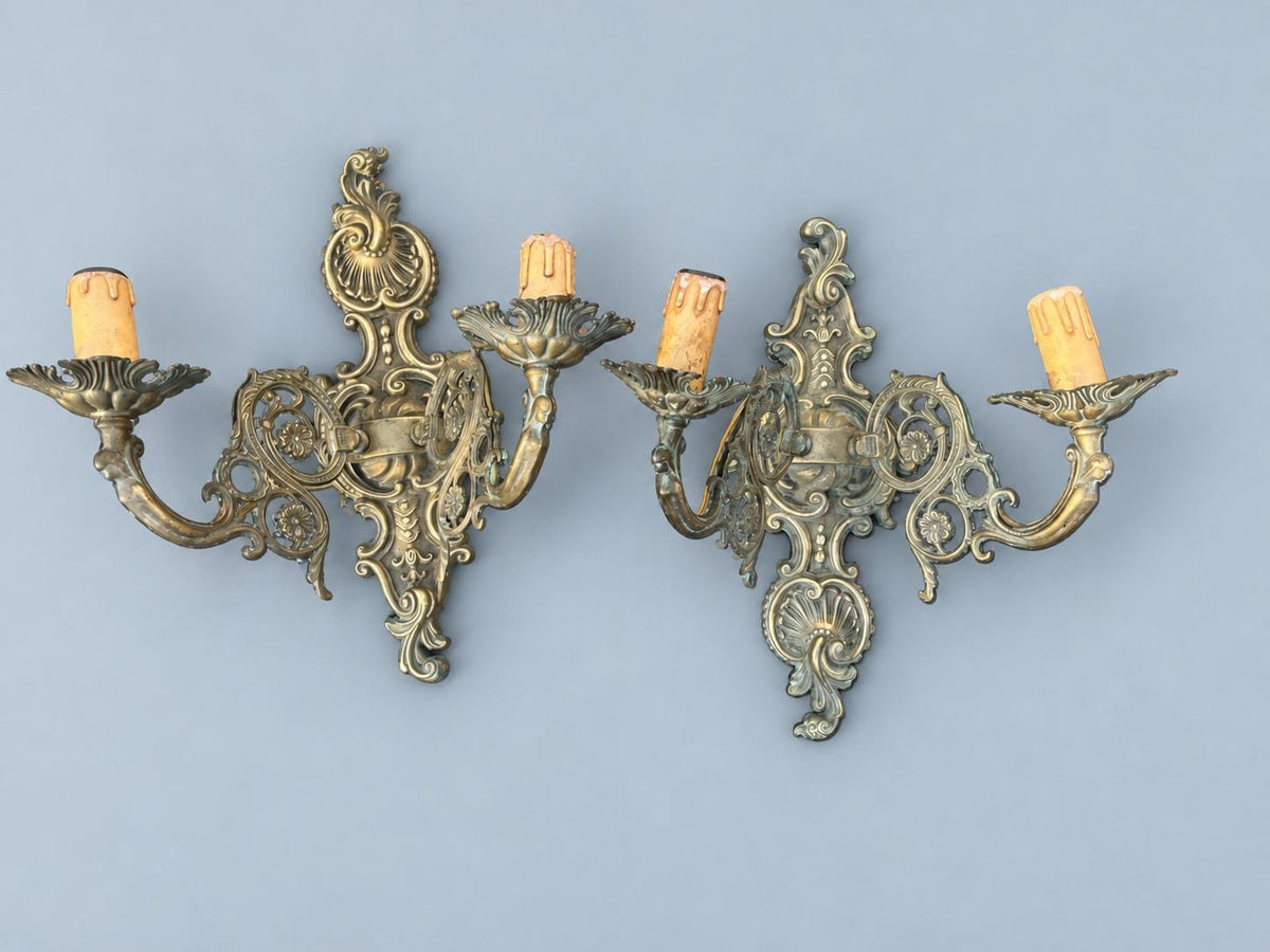 Vintage Pair of Louis XV Rocaille Style Wall Sconces, Cast Metal with Green Patina, Shell Crest and Pierced Scroll Arms, Two Lights Each