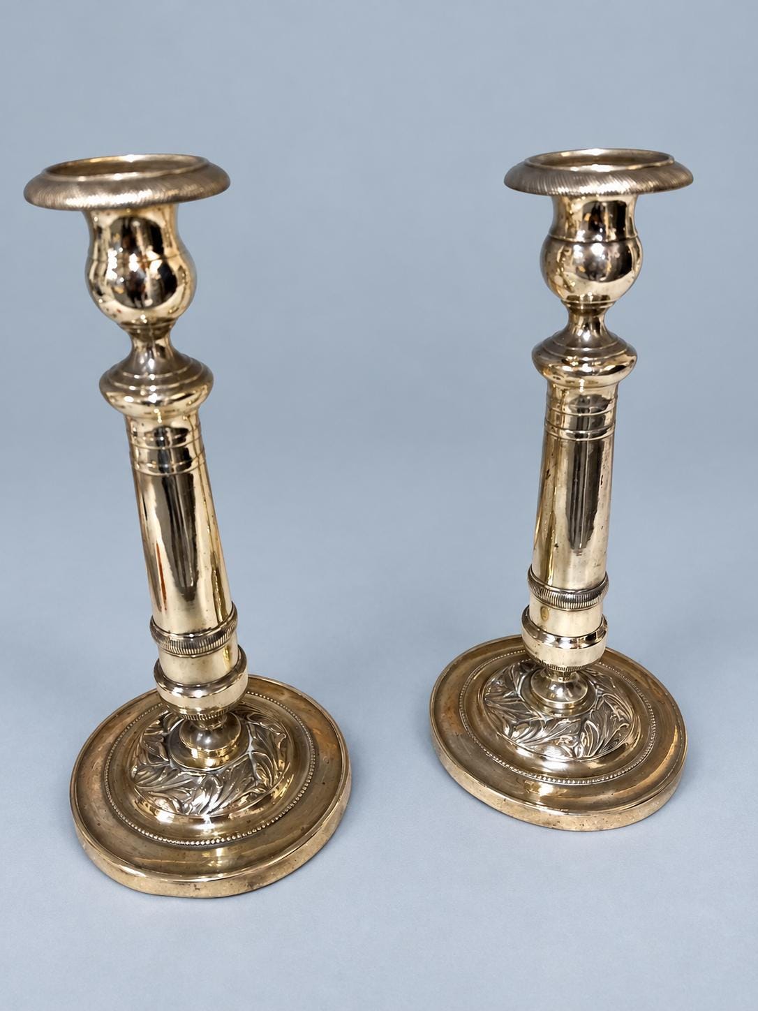 Vintage Small Pair of Empire Style Column Candlesticks, Polished Gold-Tone Metal with Leaf-Decorated Bases, 24 cm