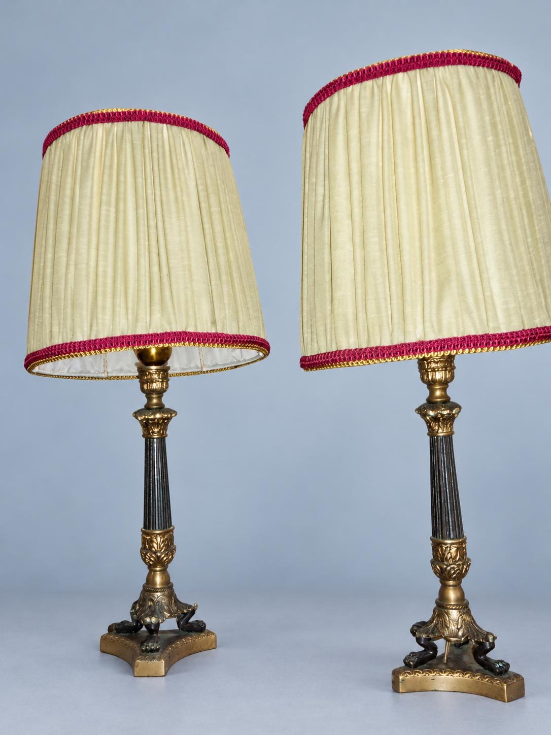 Vintage Pair of Empire Style Column Table Lamps, Dark Patinated and Gilt Metal on Lion Paw Tripod Bases, with Pleated Shades, 35 cm