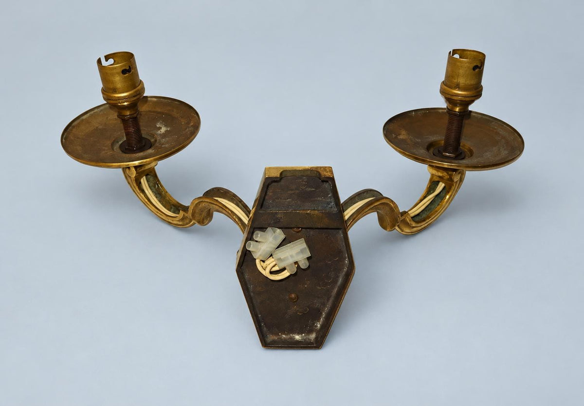 Vintage Pair of Louis XIV Style Polished Brass Wall Sconces, Faceted Backplates with Heavy Scroll Arms, Two Lights Each