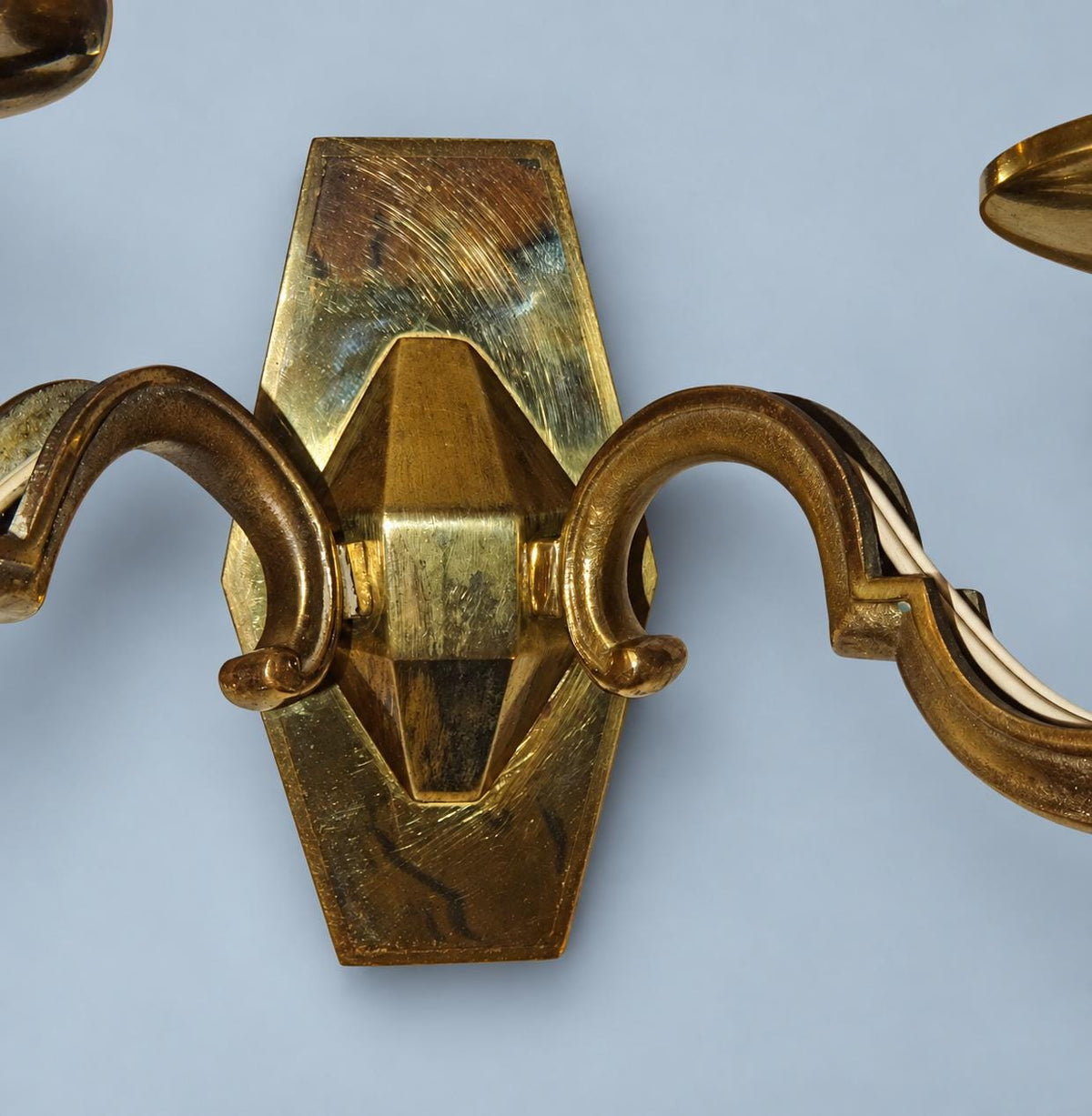 Vintage Pair of Louis XIV Style Polished Brass Wall Sconces, Faceted Backplates with Heavy Scroll Arms, Two Lights Each