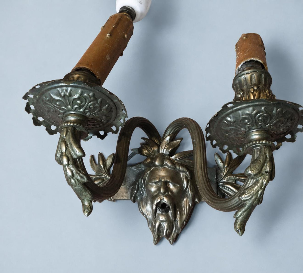 Vintage Pair of Wall Sconces with Bearded Bacchus-Style Masks, Patinated Metal with Leafy Arms, Two Lights Each