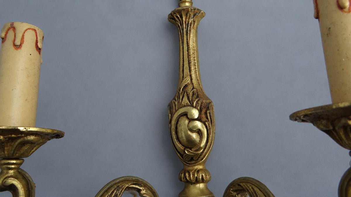 Vintage Pair of Louis XV Style Gilt Metal Wall Sconces, Flame Finials and C-Scroll Backplates, Leafy Scrolled Arms, Two Lights Each