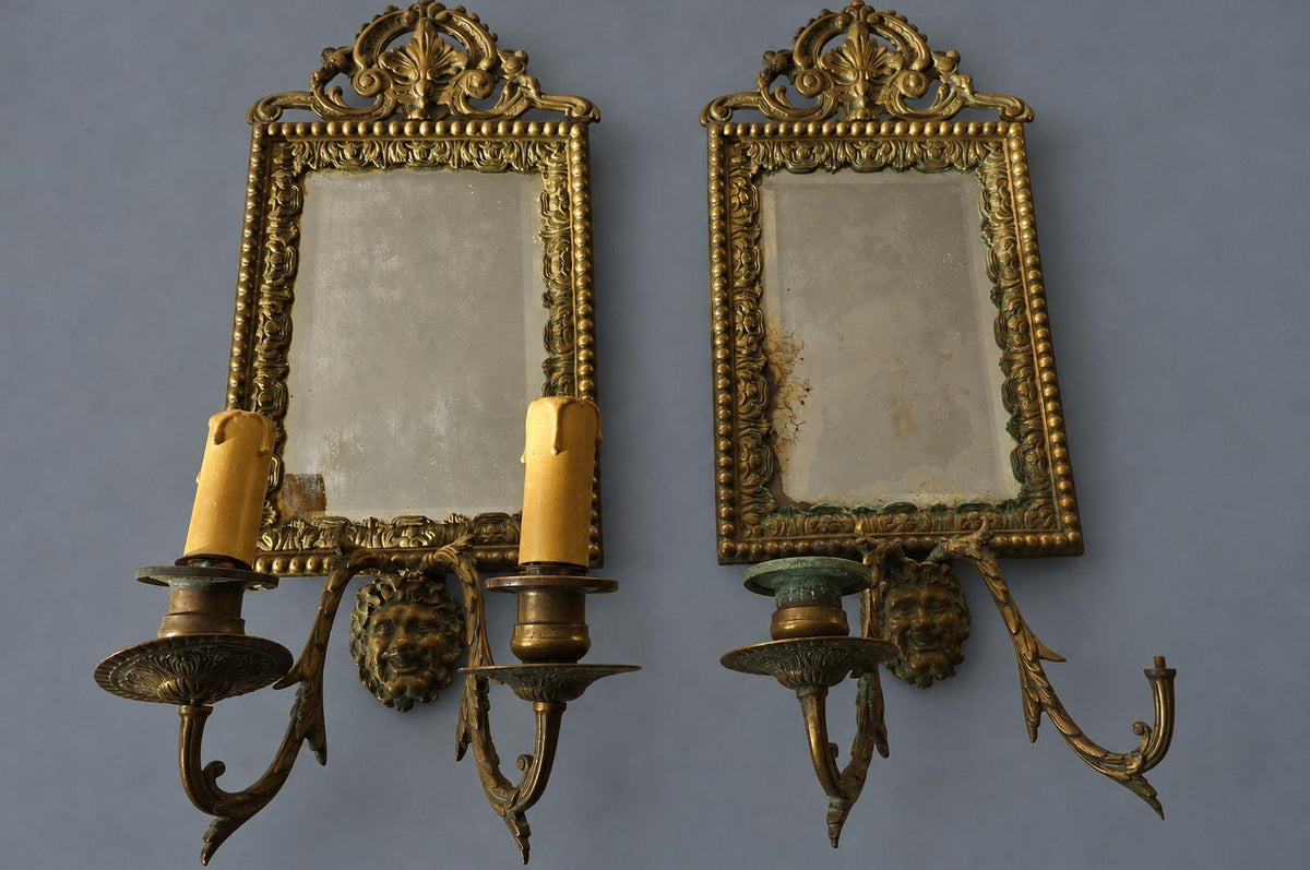 Vintage Pair of Mirror Wall Sconces with Masks, Patinated Metal Beaded Frames and Palmette Crests, Bevelled Mirrors, Two Lights Each, 41 cm