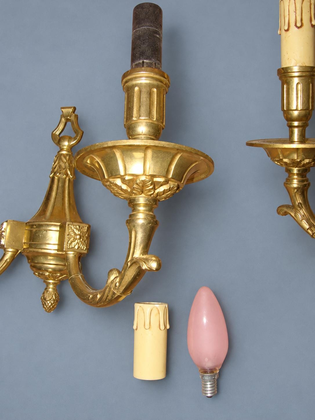 Vintage Pair of Louis XVI Style Gilt Metal Wall Sconces, Ring-Topped Baluster Backplates with Rosettes, Attributed Early 20th Century