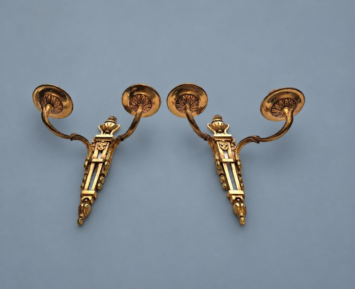 Vintage Pair of Louis XVI Style Two-Arm Candle Sconces, Gilt Metal with Flaming Urn Finials and Pierced Backplates, Late 19th Century, 26 cm