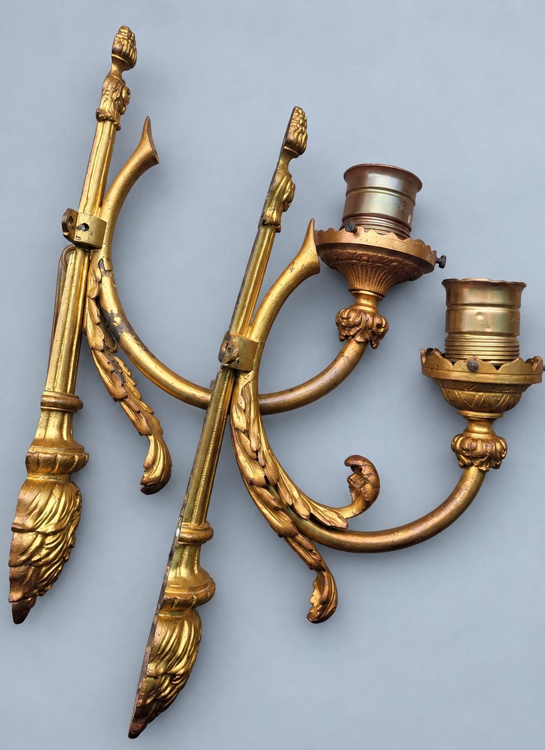 Vintage Pair of Gilt Metal Louis XVI Style Torch Wall Sconces, Single-Light with Laurel Garland and Curved Arm