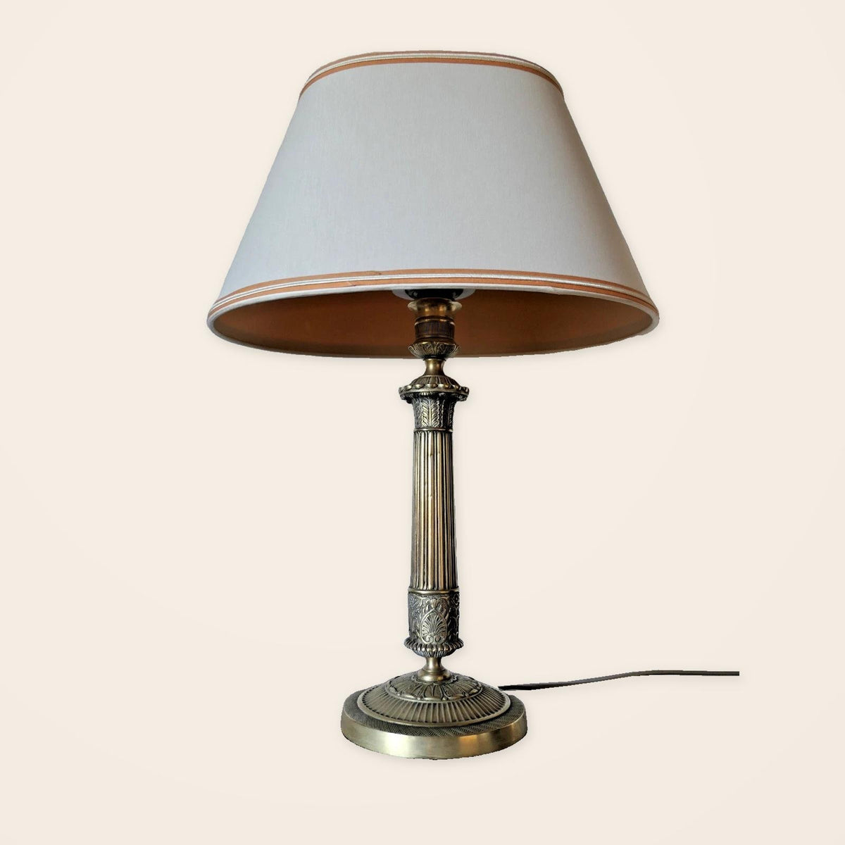 Vintage Empire Style Bronze Column Table Lamp, Fluted Candlestick Base with Palmette Band, Oval Ivory Shade with Apricot Trim