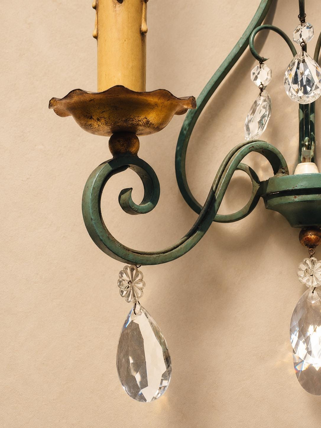 Pair of Vintage 1950s Verdigris Wrought Iron Wall Sconces, Gilt Fleur-de-Lis Crest, Glass Drops, Hollywood Regency Lights